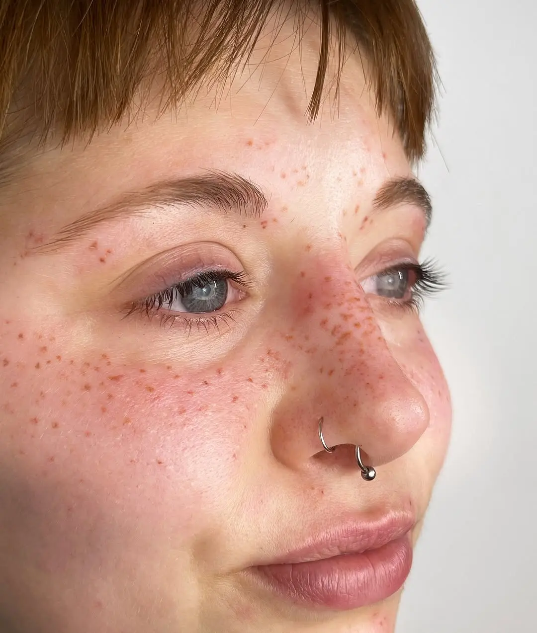 Natural freckle tattoos for a sun-kissed look