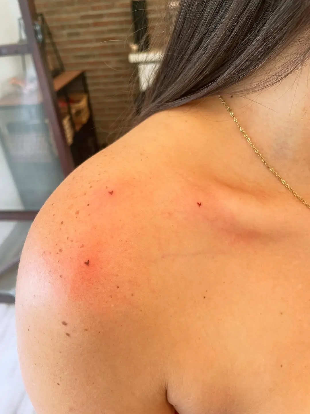 Charming freckle tattoos with heart shapes