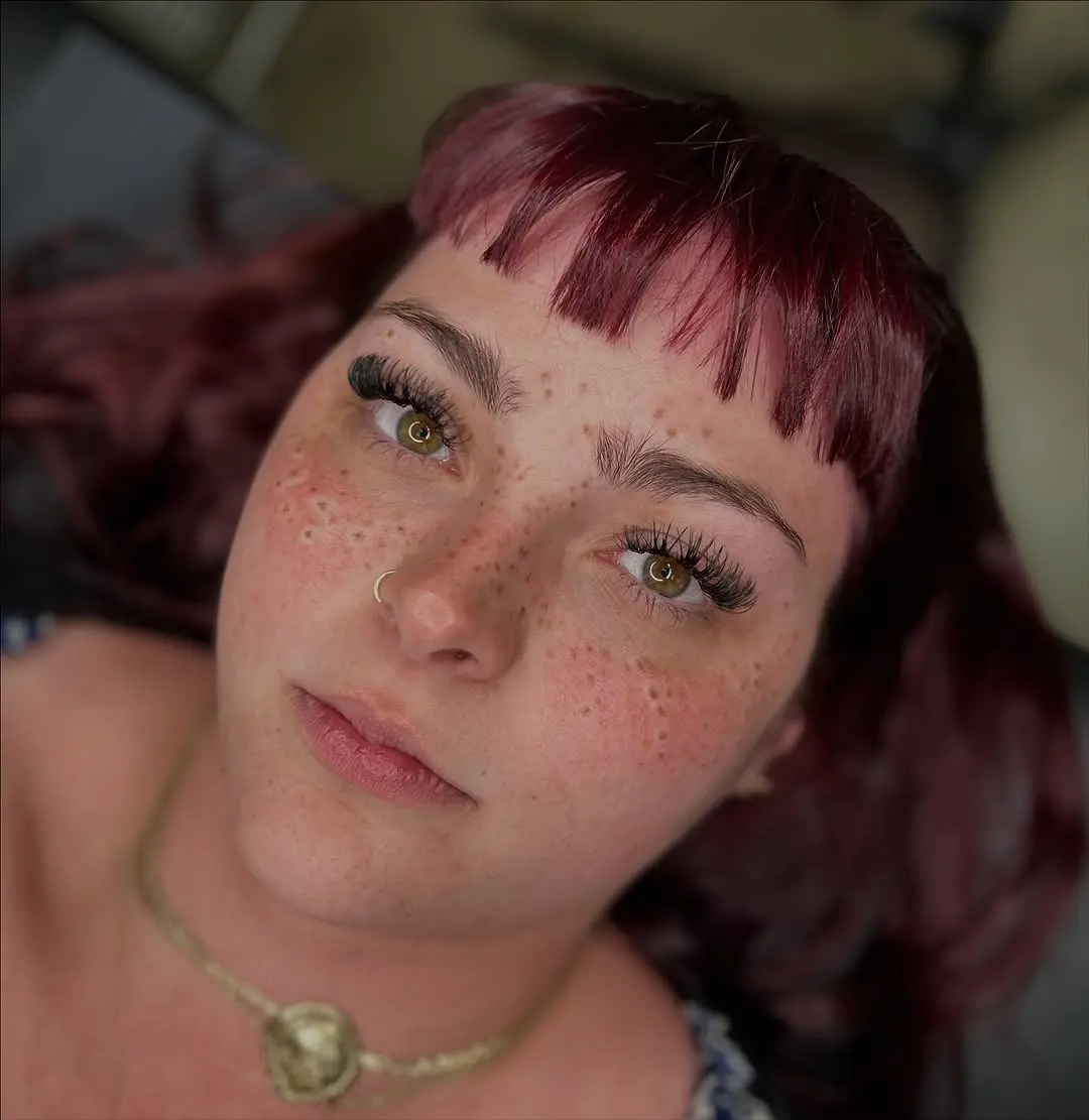 A close-up view of stunning freckle tattoos
