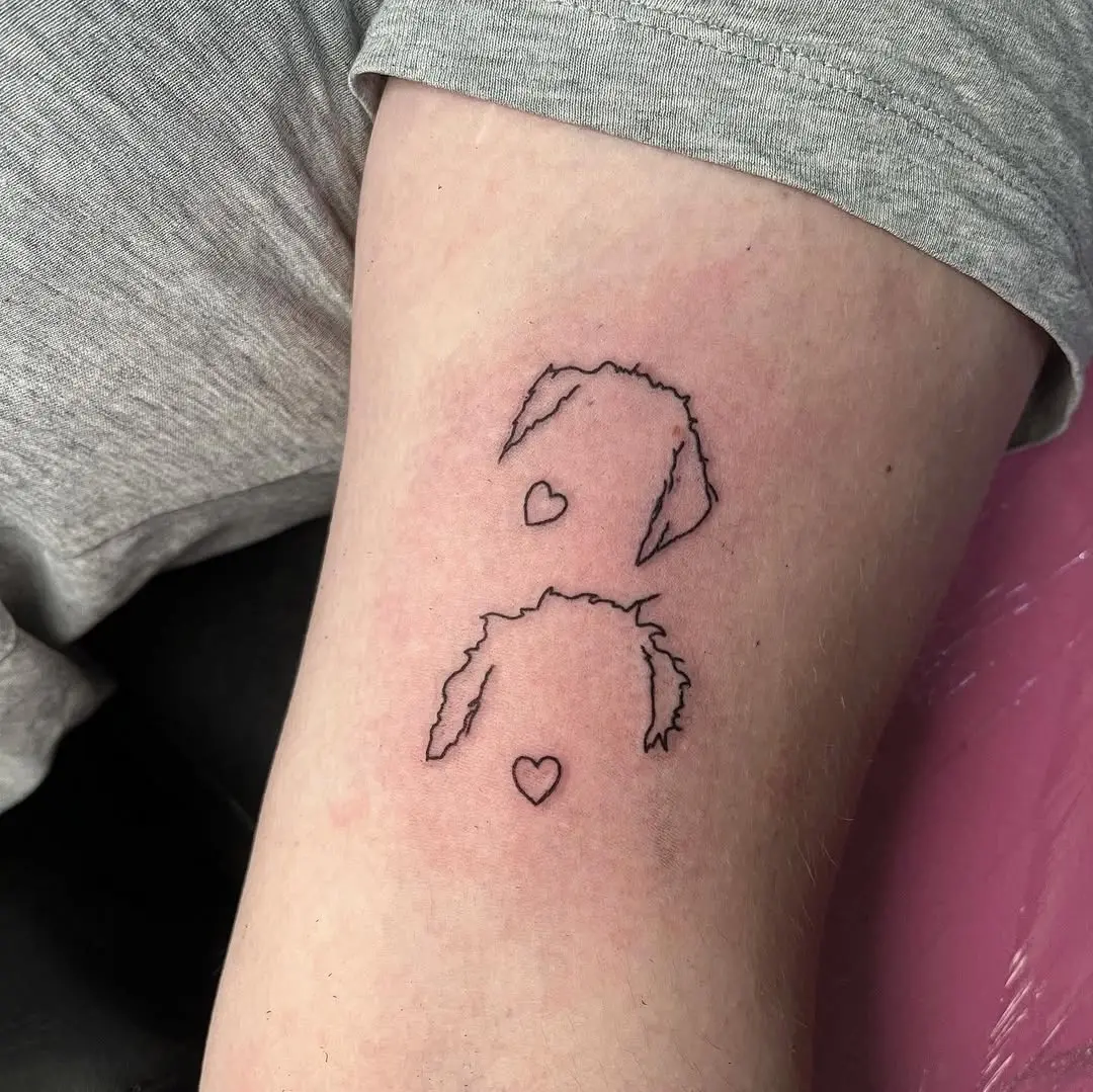Charming Minimalist Dog Ear Tattoo Design
