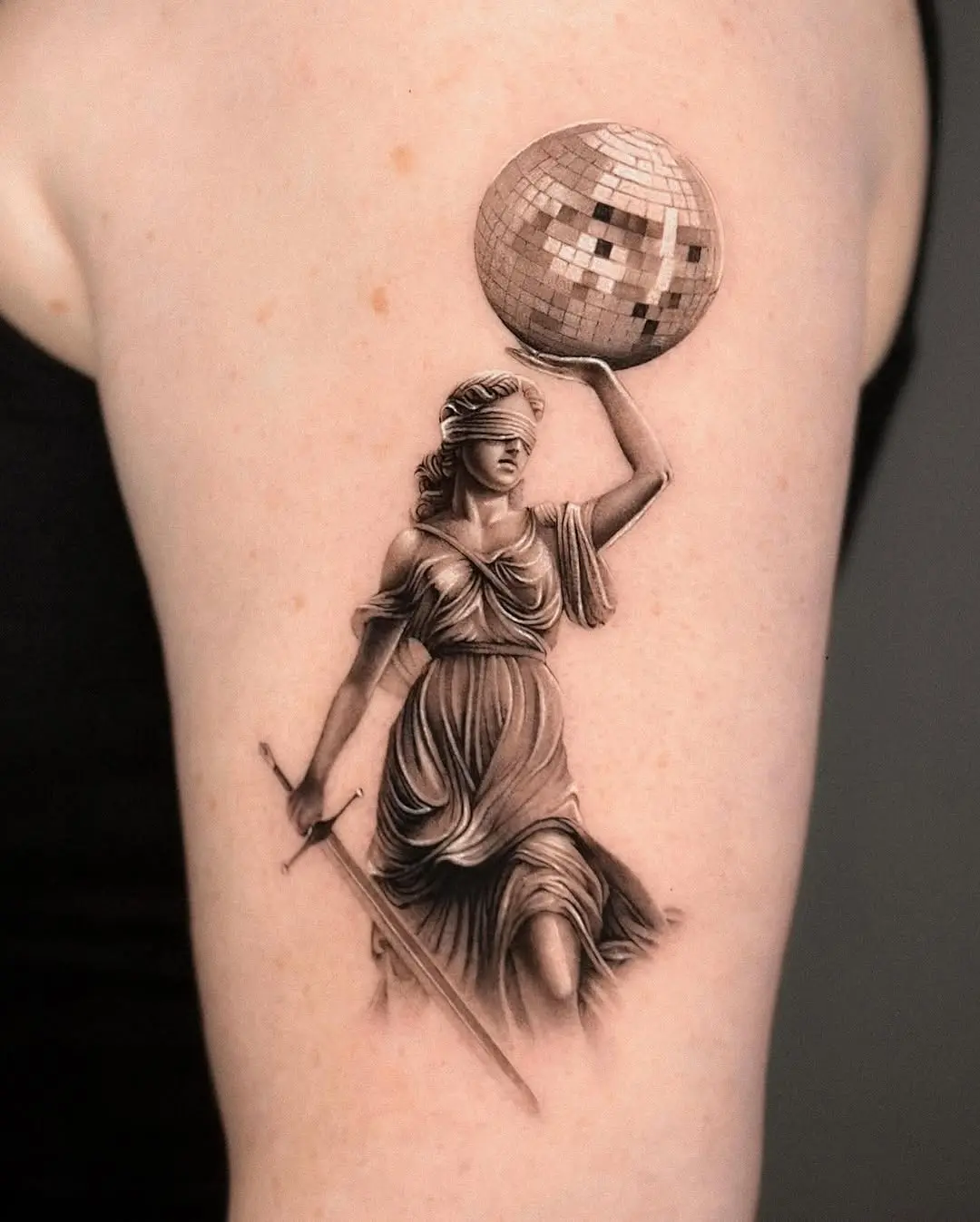 Chic Lady Justice with Disco Ball Tattoo
