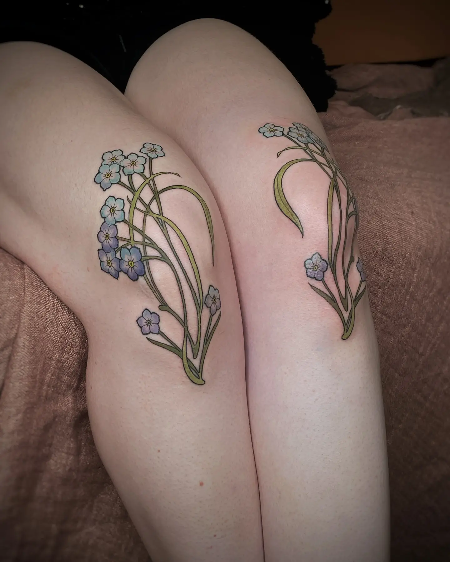 Elegant Forget-Me-Nots Tattoo on Knees