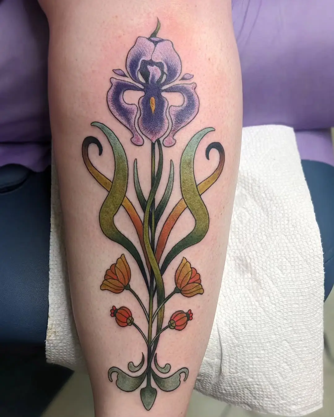 Intricate art nouveau iris tattoo design for elegance