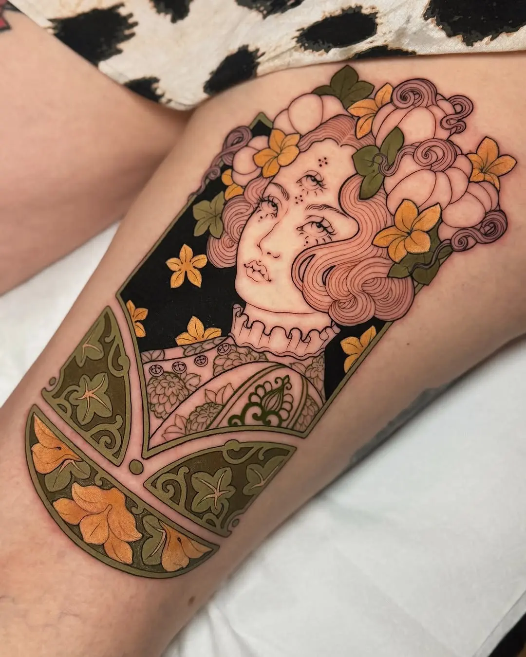 Elegant art nouveau tattoo of a floral woman