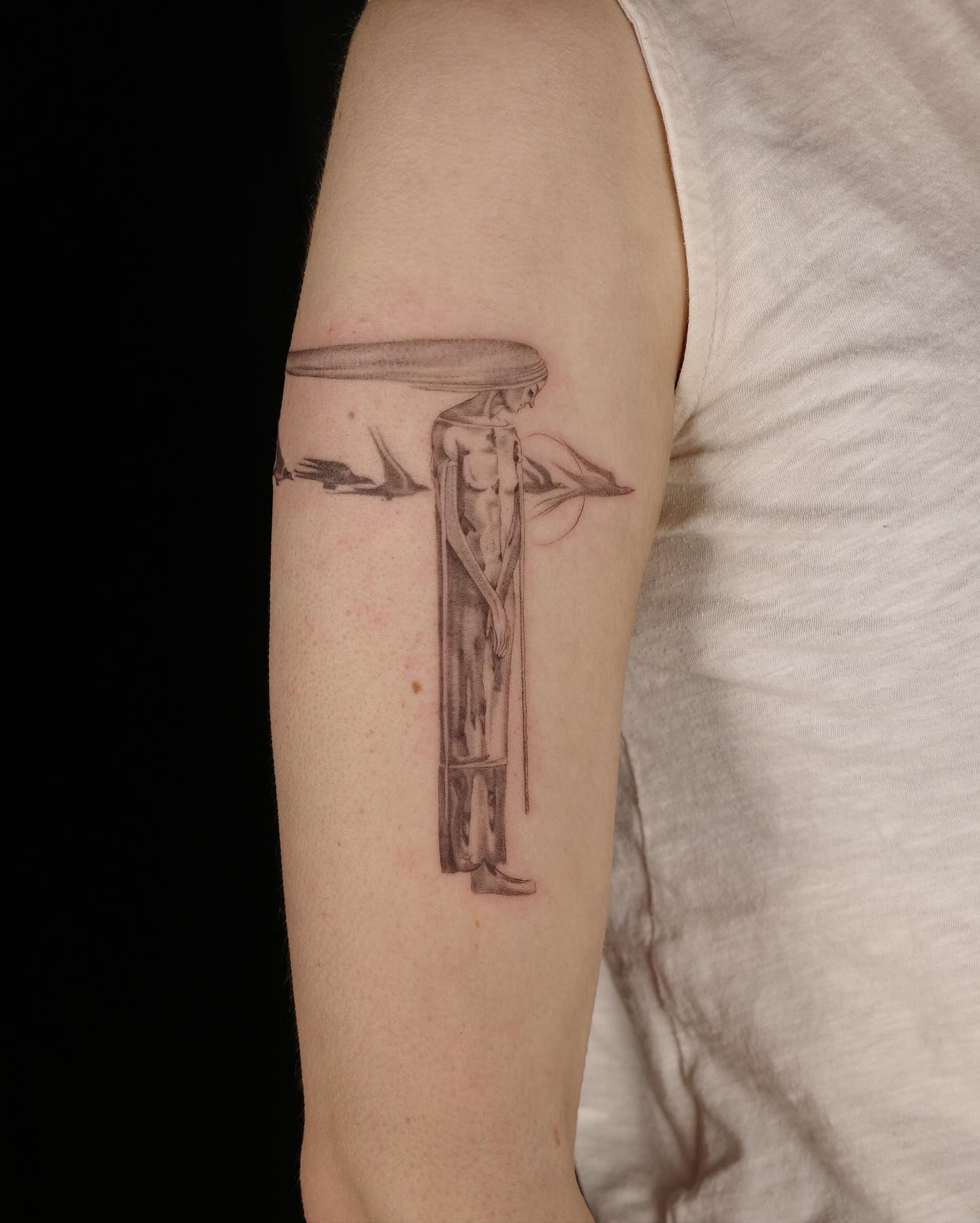 Elegant art nouveau tattoo on display