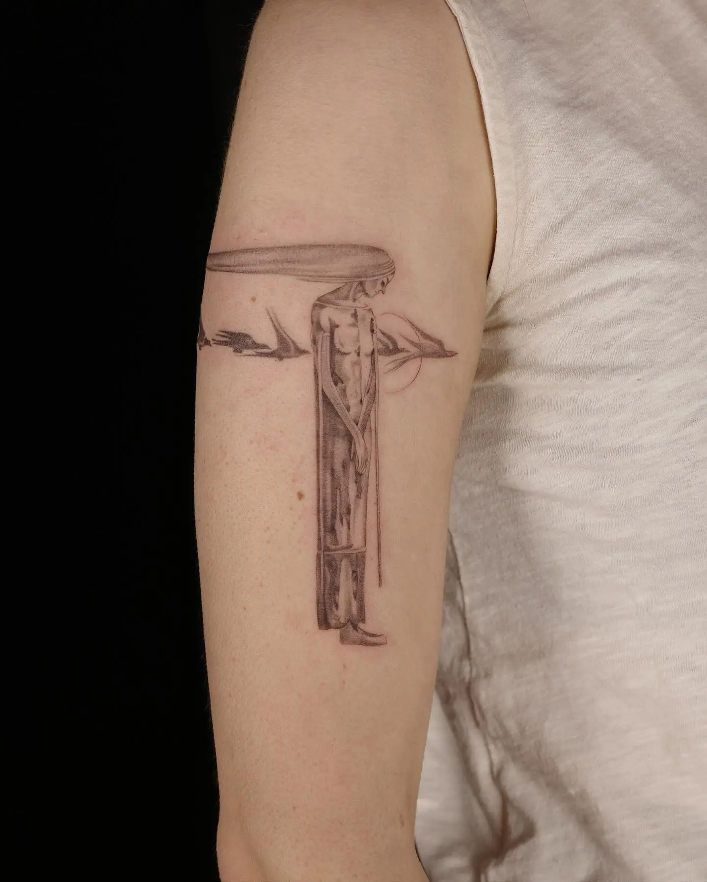 Elegant art nouveau tattoo on display
