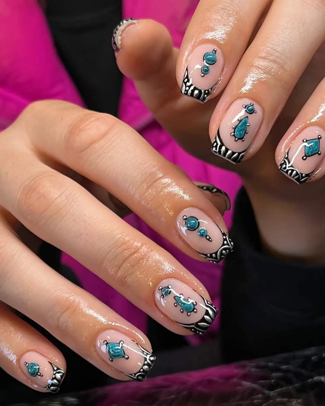 Stunning Aztec Nail Art with Teal Accents