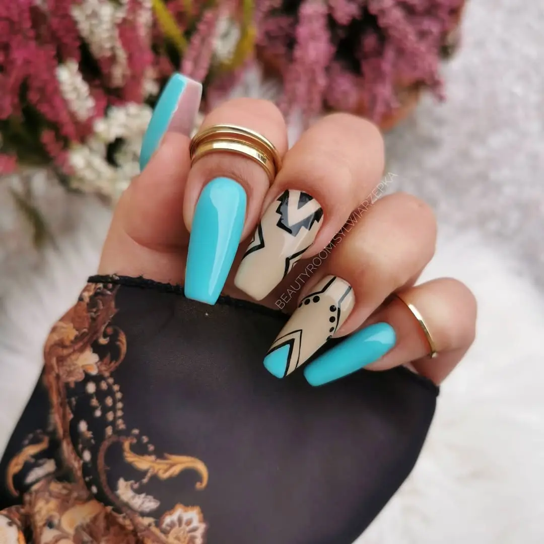 Bold Aztec-inspired nails with geometric design