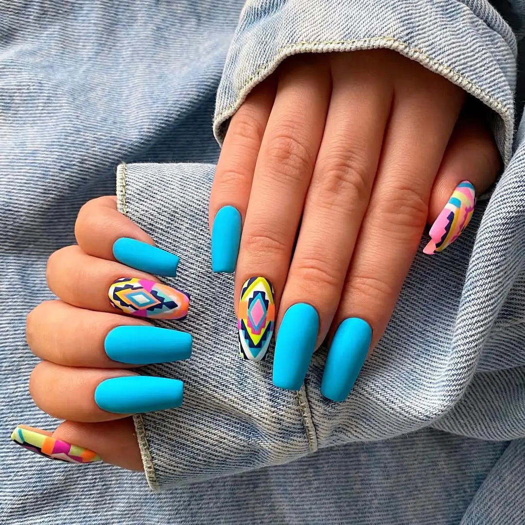 Vibrant Aztec Nail Art with Geometric Patterns