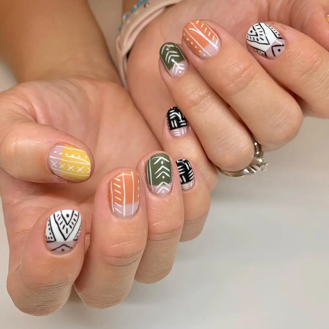 Vibrant Aztec Nail Art with Bold Patterns