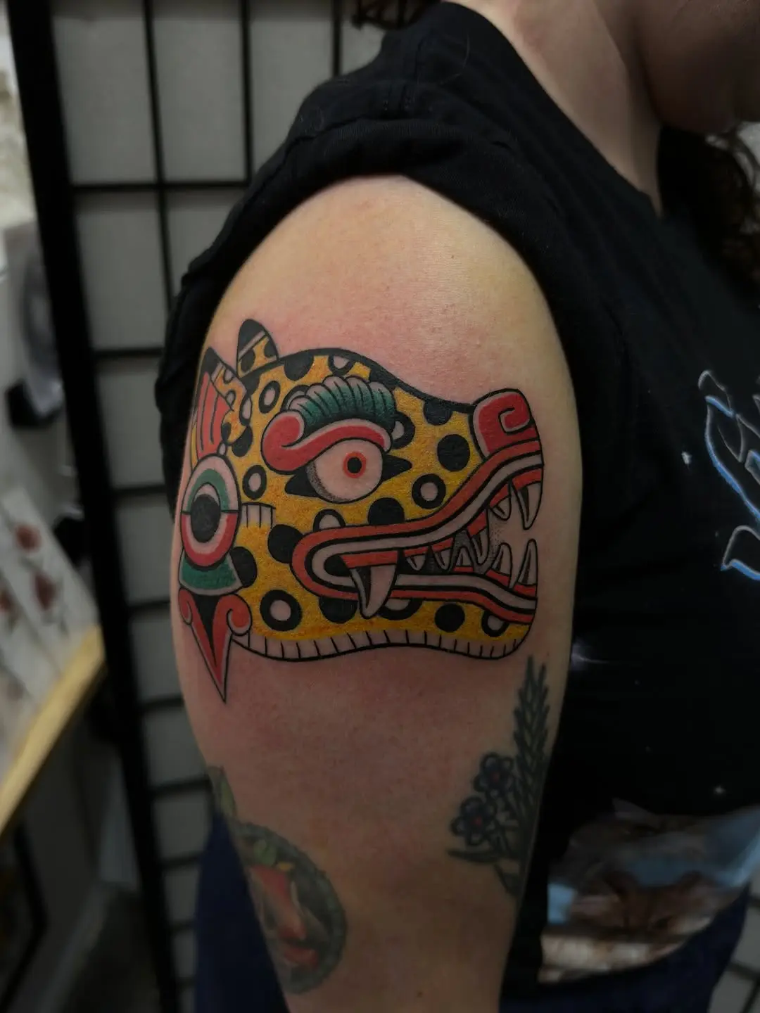 Vibrant Aztec Dog God Tattoo Design
