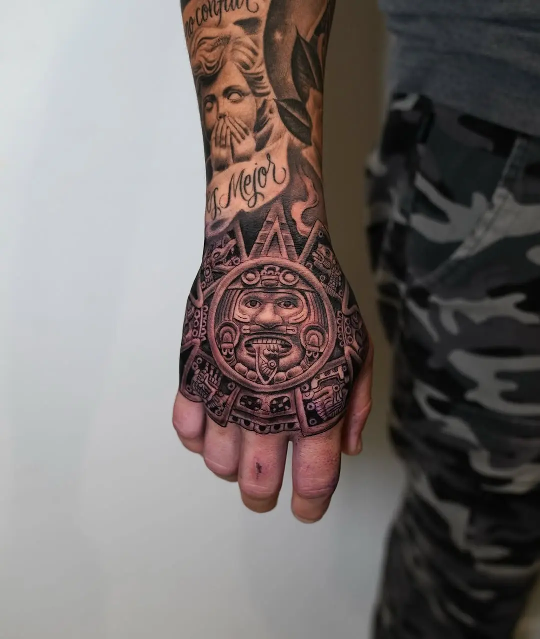 Intricate Aztec Sun Symbol Tattoo Design