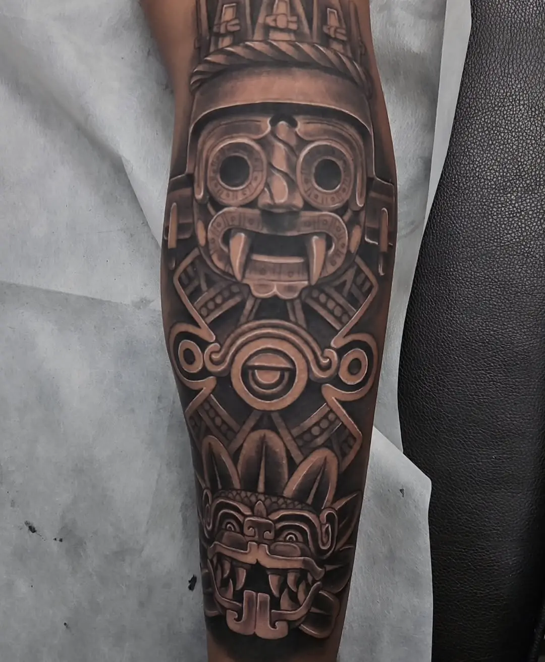 Intricate Aztec Tattoo with Iconic Motifs