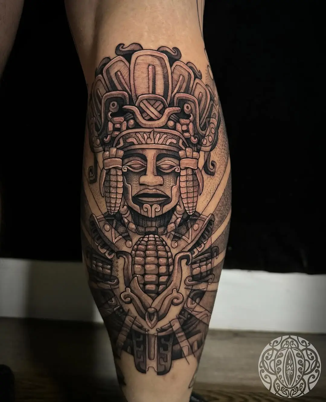 Intricate Aztec God Tattoo on Leg