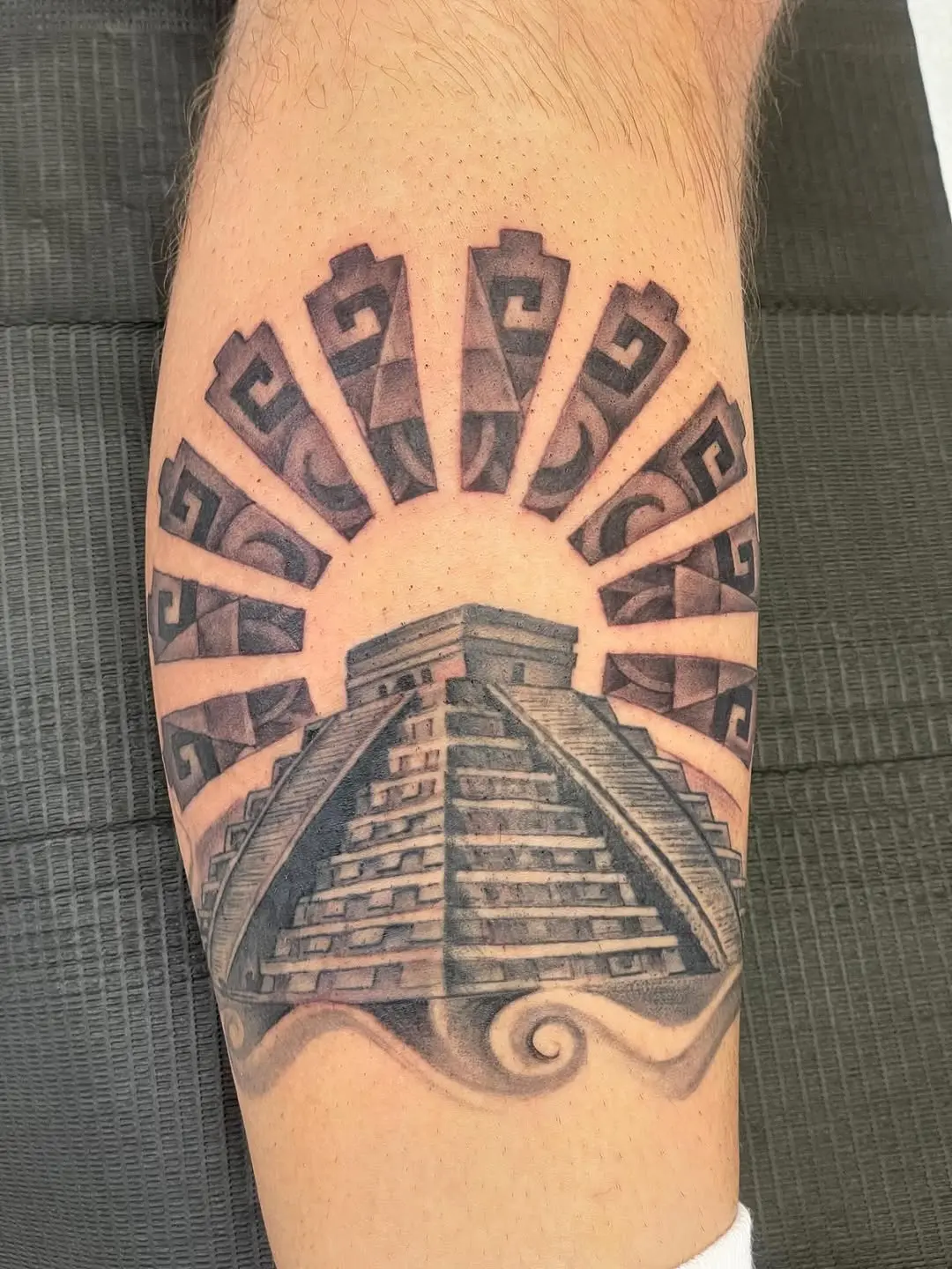 Stunning Aztec Pyramid Tattoo with Sun Rays