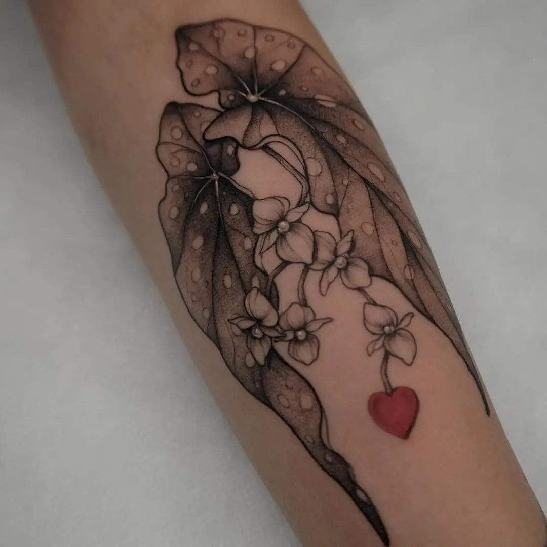 Elegant begonia tattoo with a heart motif