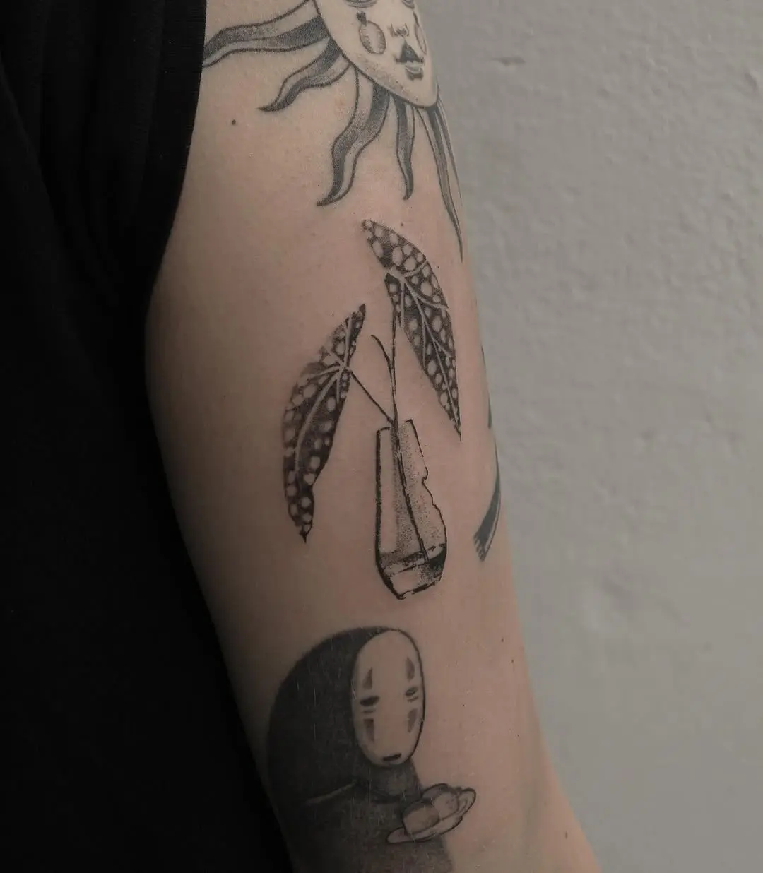 Elegant begonia tattoo with artistic flair