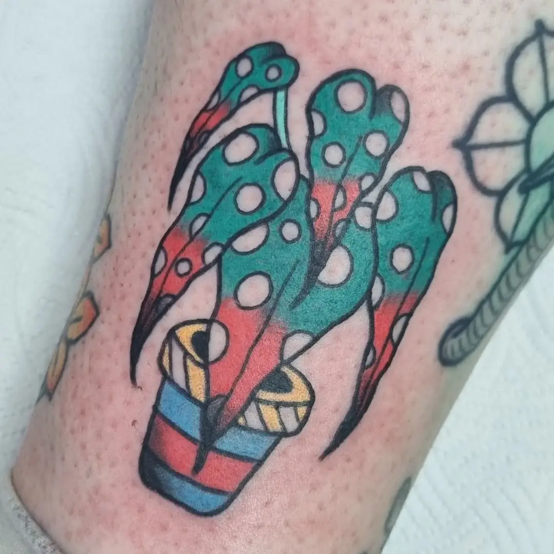 Vibrant Begonia Tattoo in a Potted Design