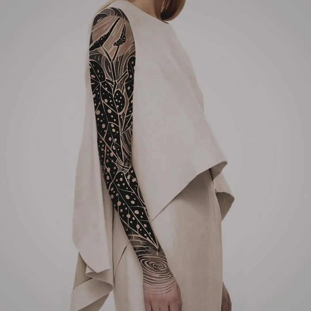 Elegant begonia tattoo with modern flair