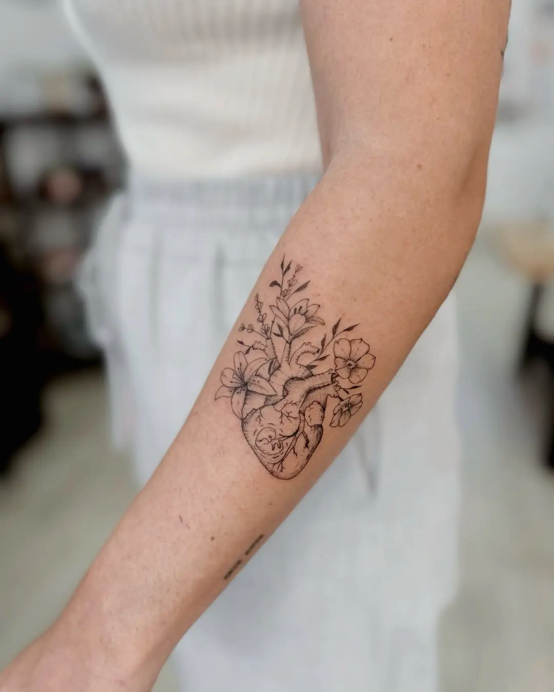 Elegant Begonia Tattoo with Heart Motif