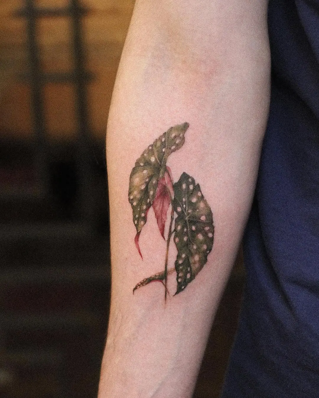 Elegant Begonia Tattoo on Forearm