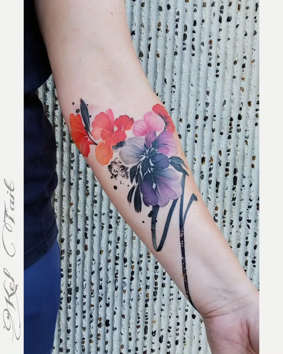 Vibrant Begonia Tattoo with Floral Elements