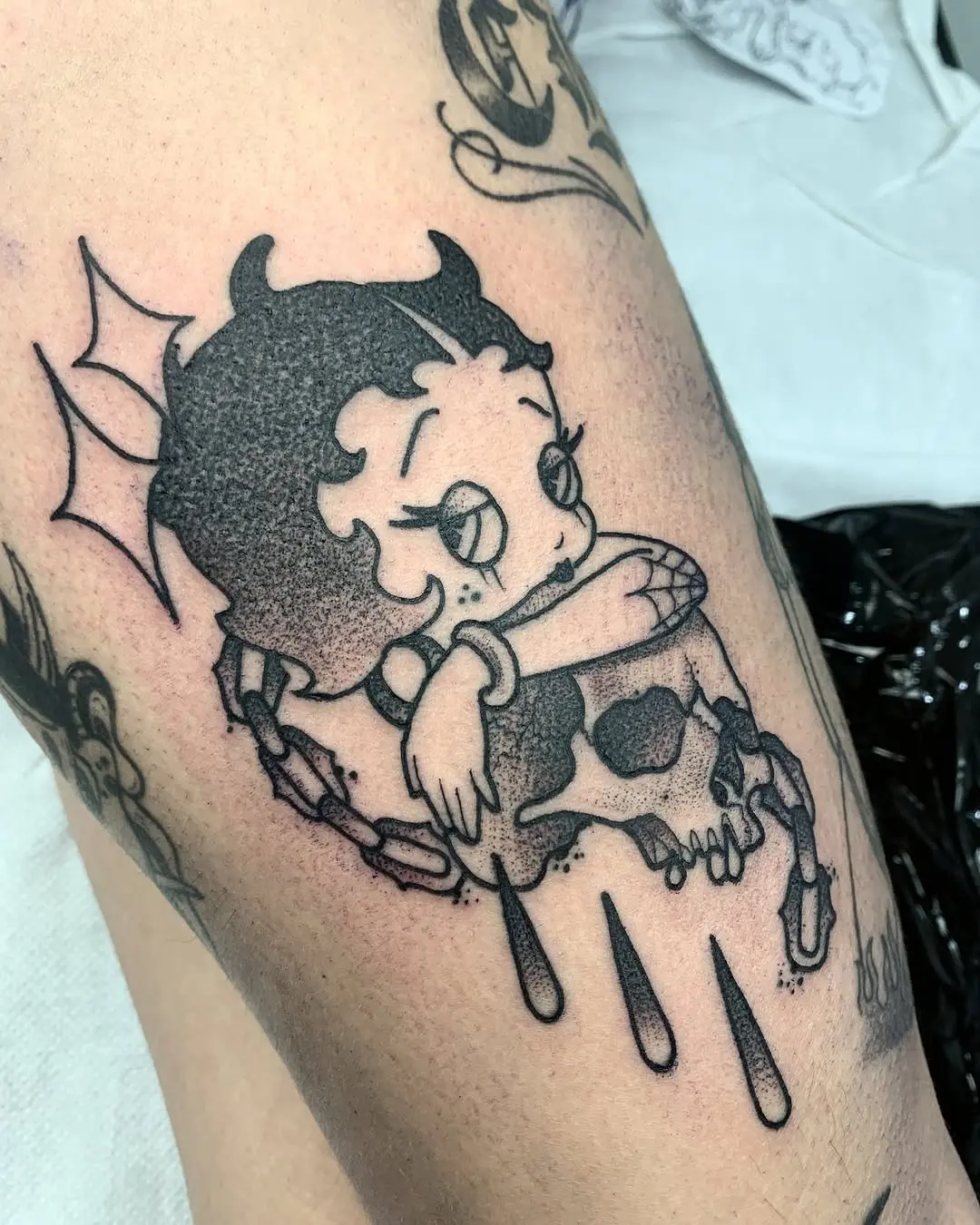 Charming Betty Boop Skull Tattoo Design