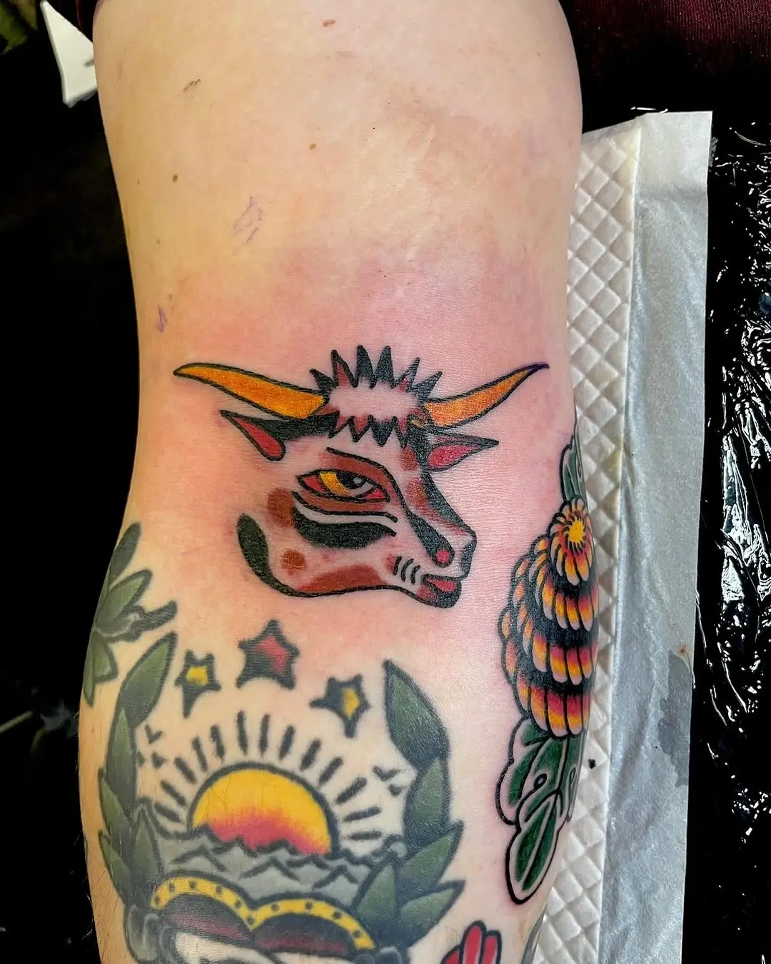 Vibrant bison tattoo with unique artistic flair