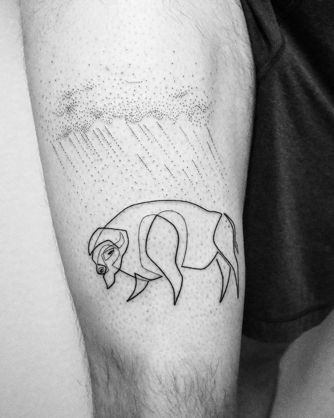 Intricate bison tattoo with fine line details