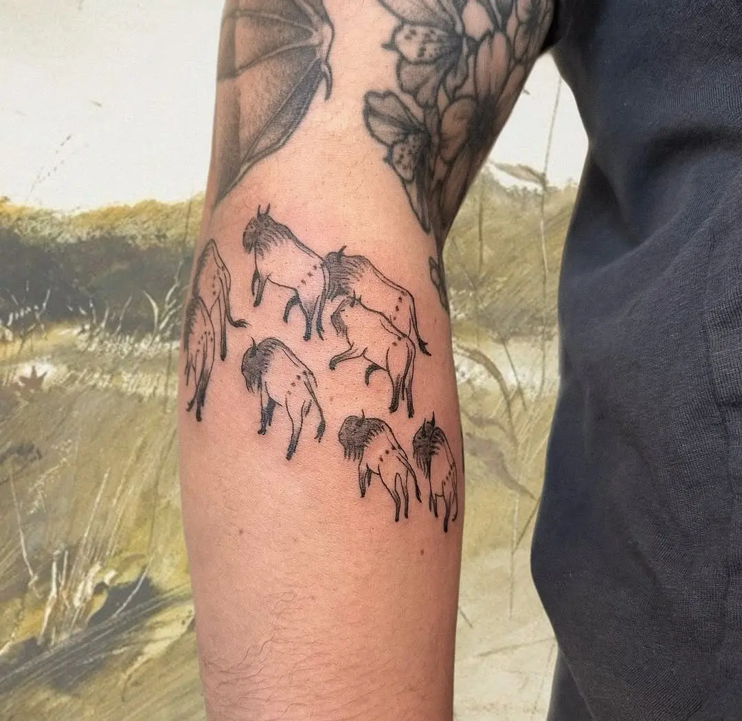 Stylized bison tattoo design in line art