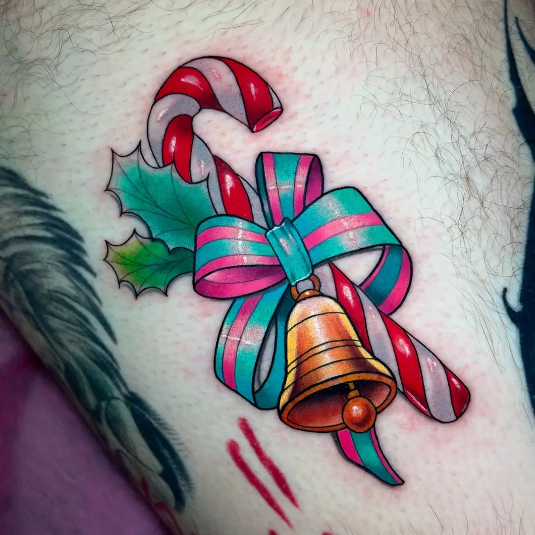 Festive candy cane tattoo with a cheerful vibe