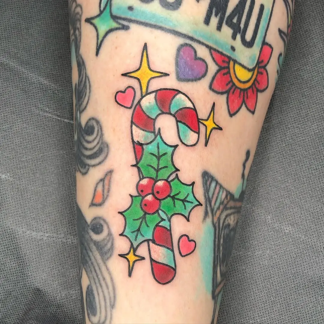 Colorful candy cane tattoo with festive details