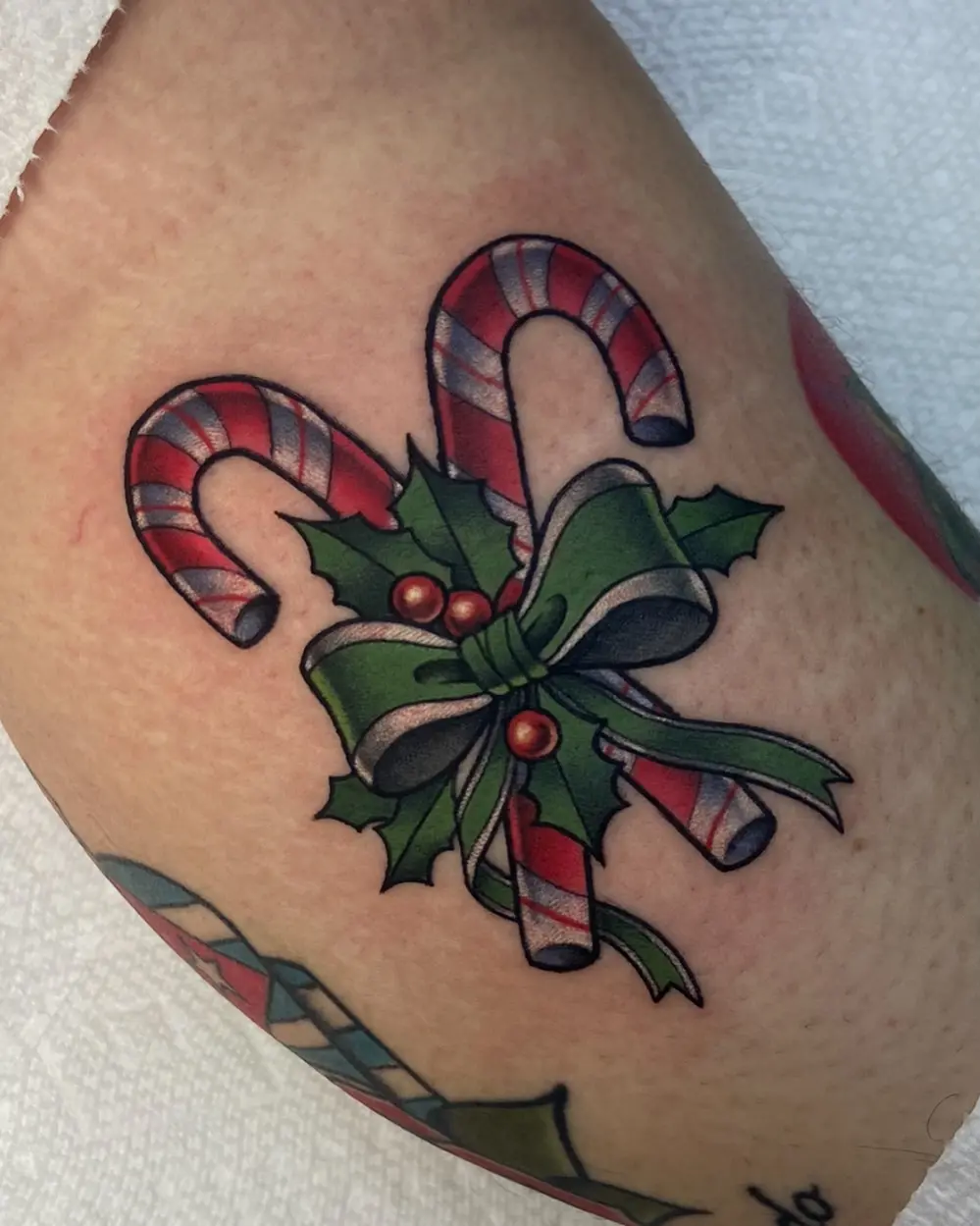 Playful candy cane design with festive holly