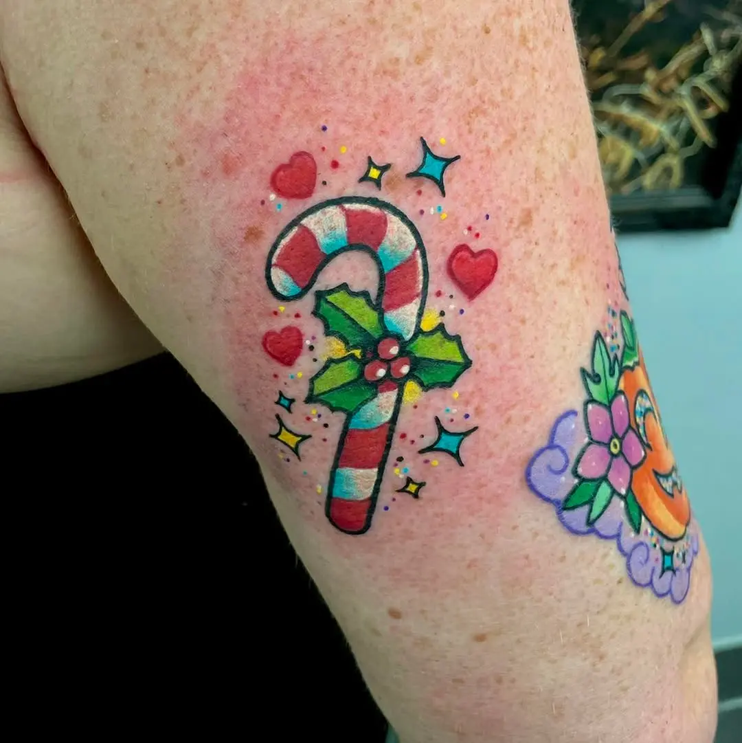 Charming candy cane tattoo with festive flair