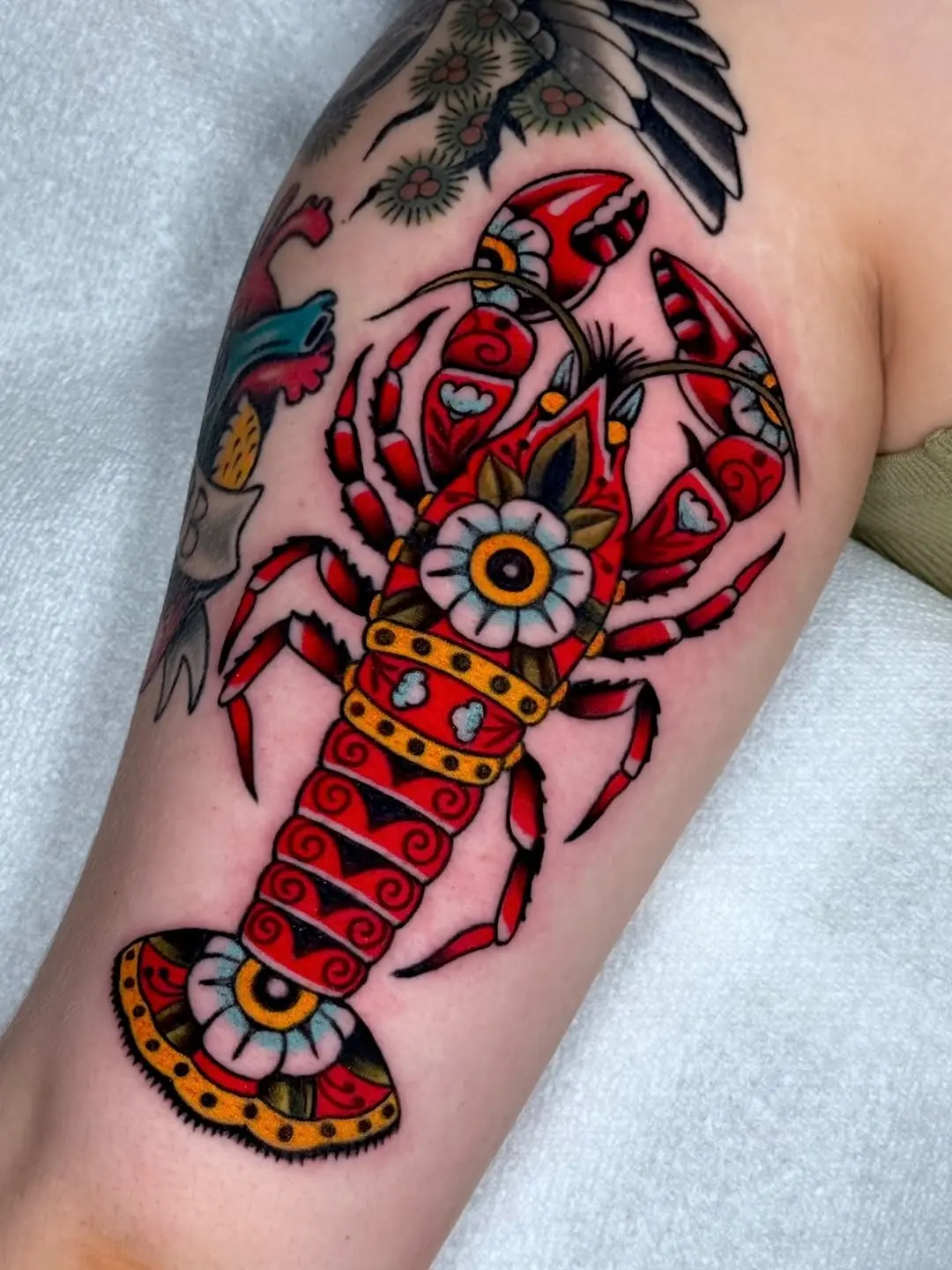 Vibrant Lobster Tattoo with Bold Colors