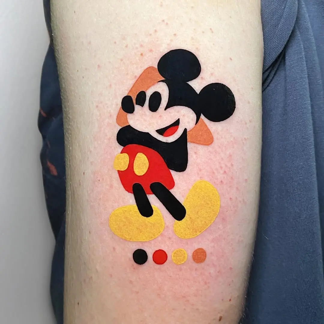 Vibrant Mickey Mouse tattoo in playful style