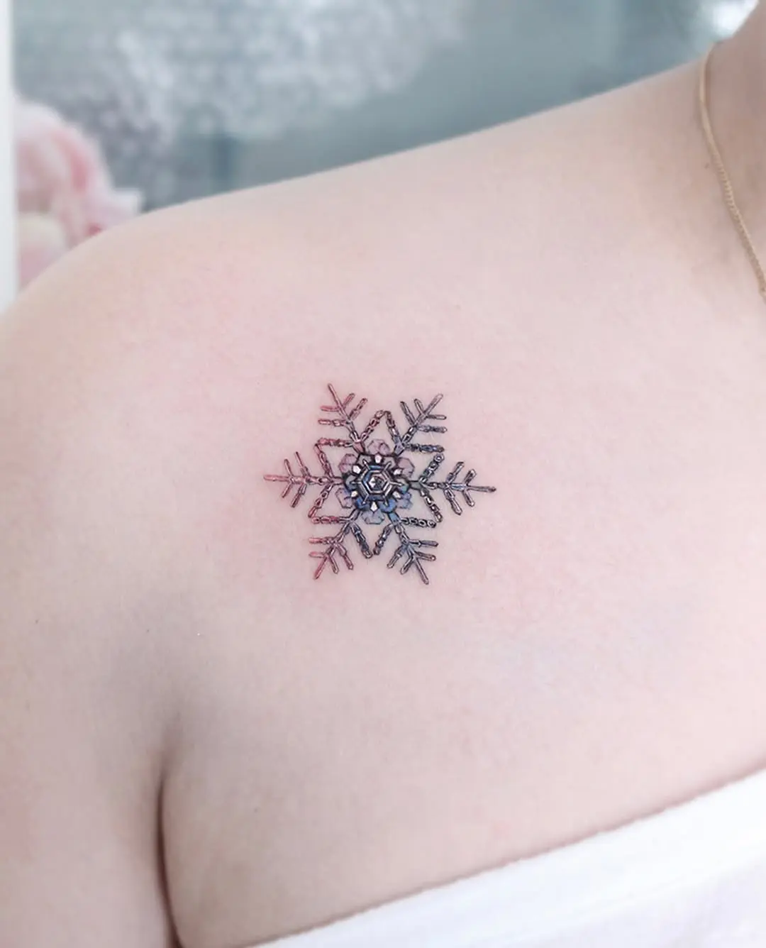 Delicate snowflake design with vibrant hues