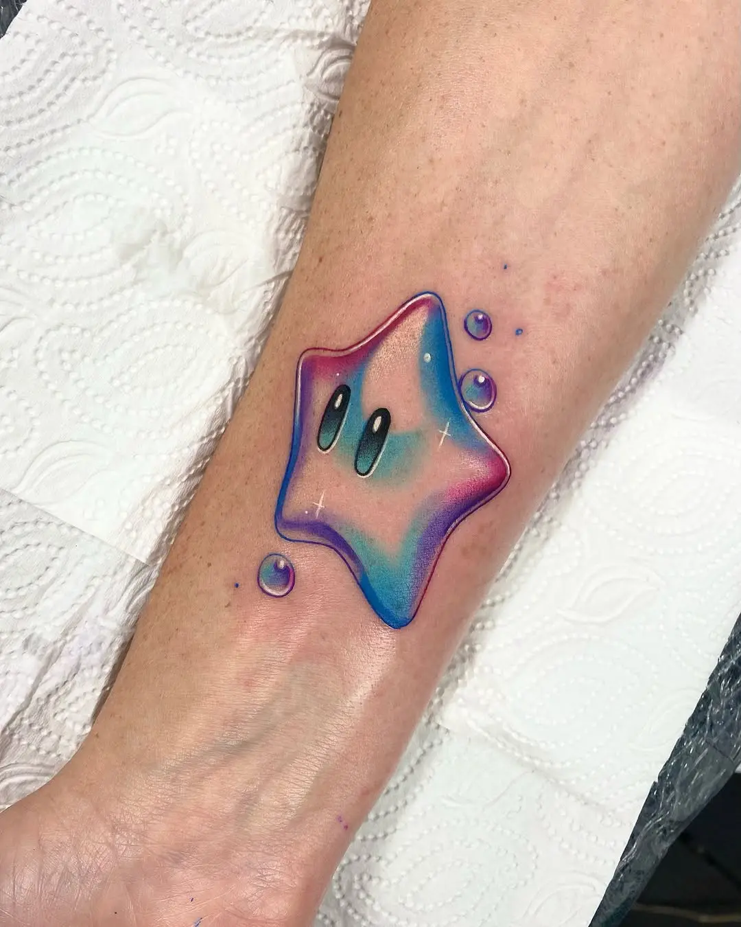 Vibrant Mario Star Tattoo with Fun Design