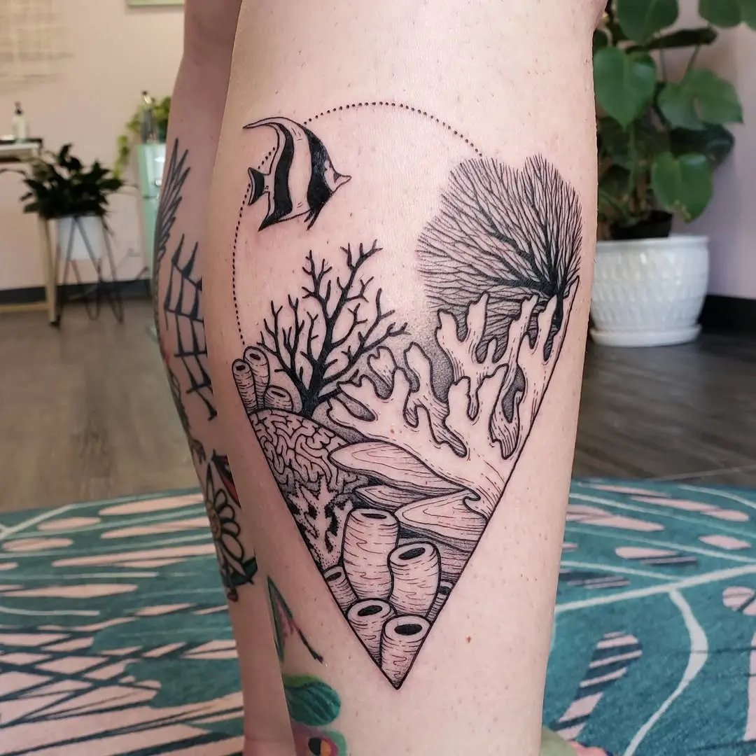 Intricate black and grey coral reef tattoo