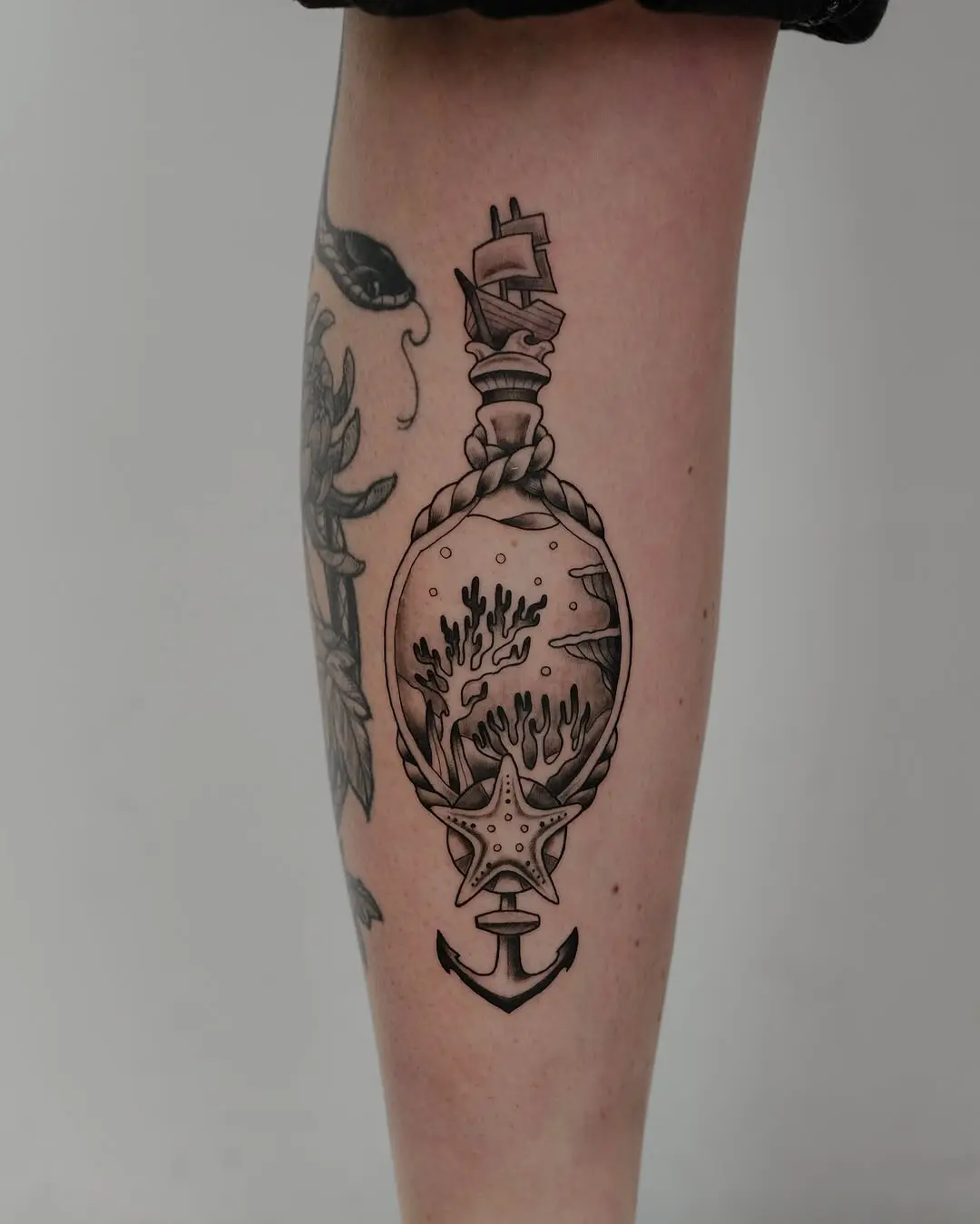 Vintage-inspired coral reef tattoo design