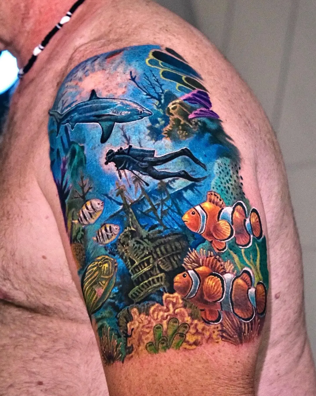 Stunning Coral Reef Tattoo with Diver and Fish