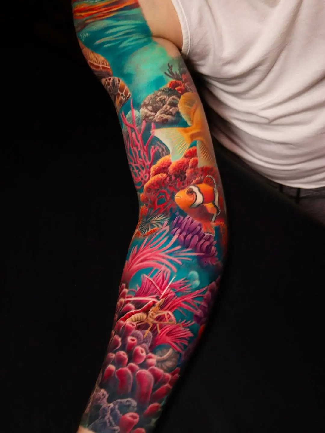 Vibrant coral reef tattoo with tropical elements
