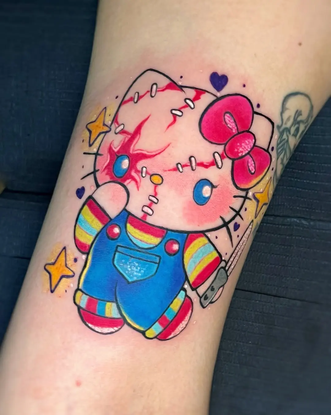 Vibrant Hello Kitty Tattoo with a Twist