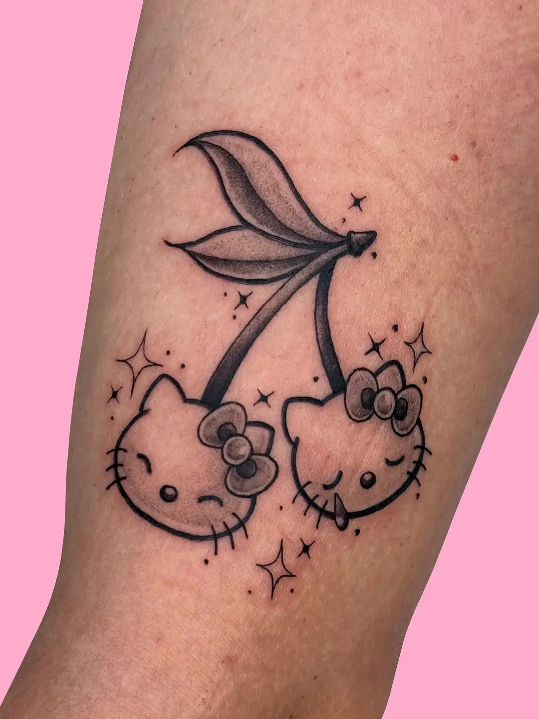 Charming Hello Kitty Cherry Blossom Tattoo