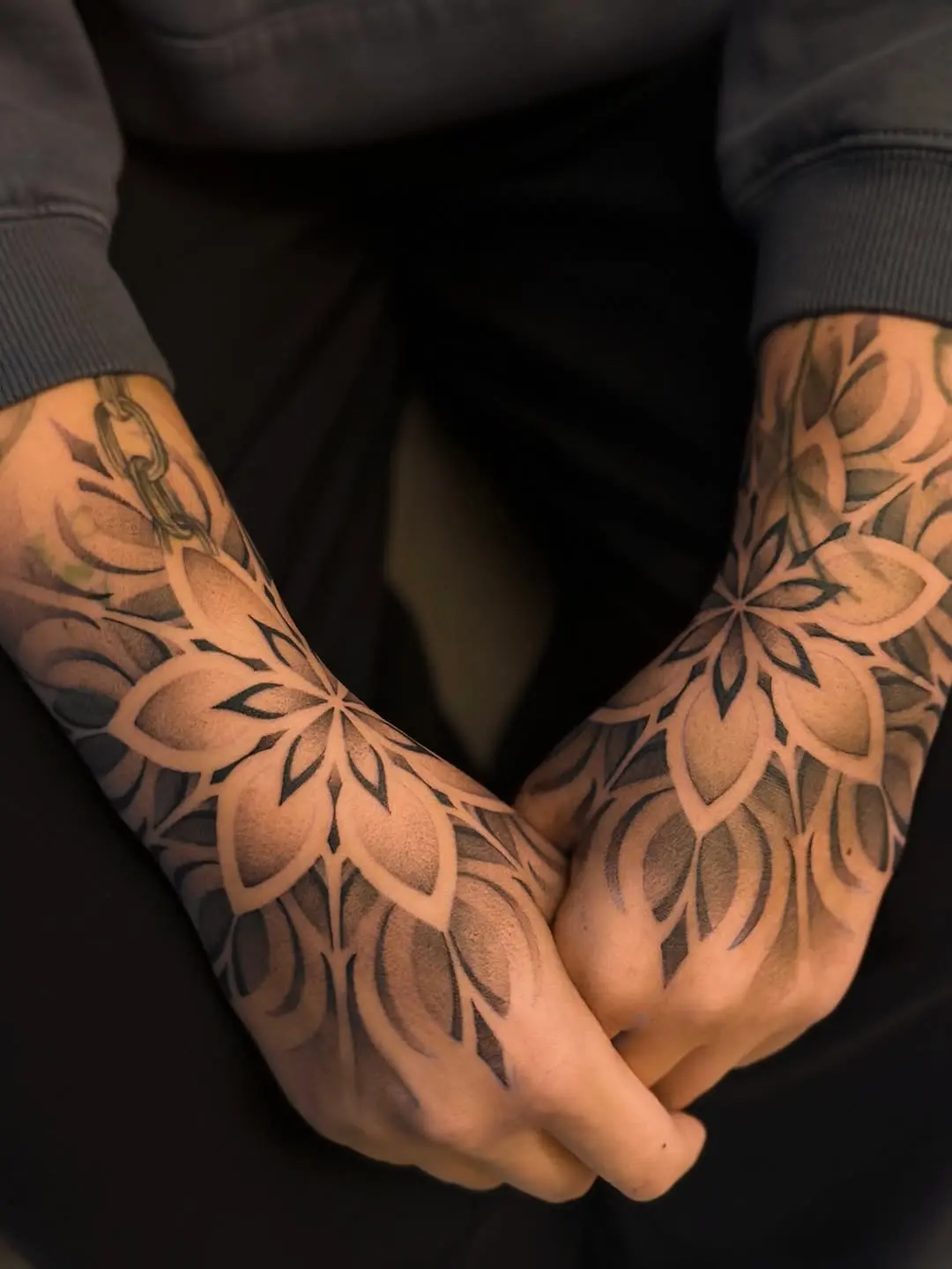 Intricate dotwork floral hand tattoos