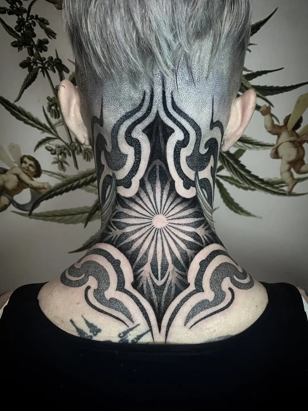 Intricate Dotwork Tattoo Design on Neck