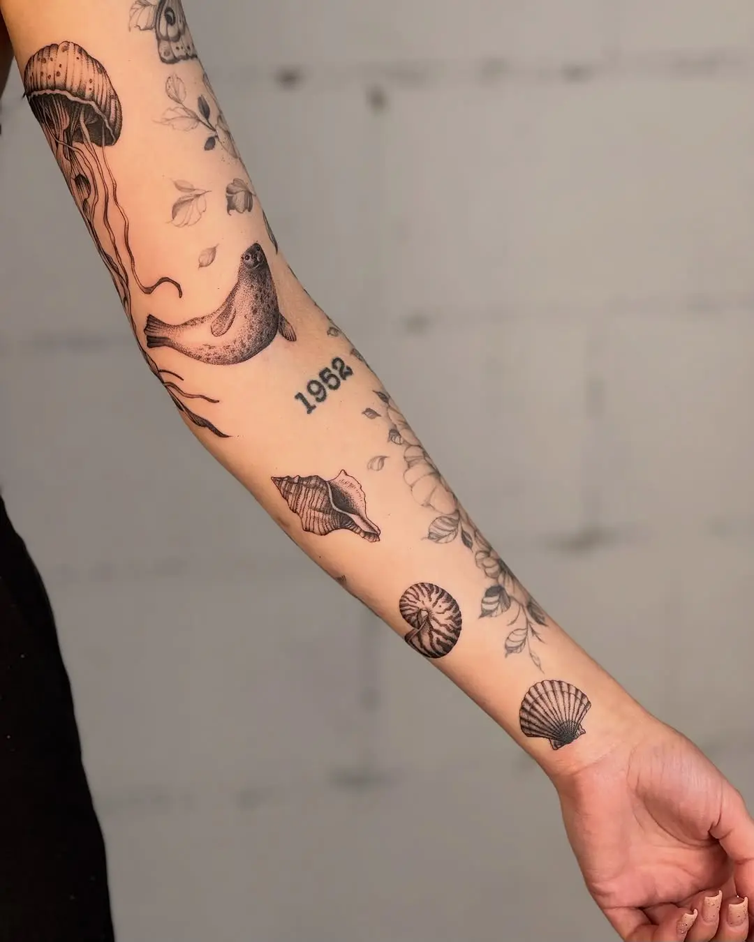 Intricate dotwork tattoos of sea wonders