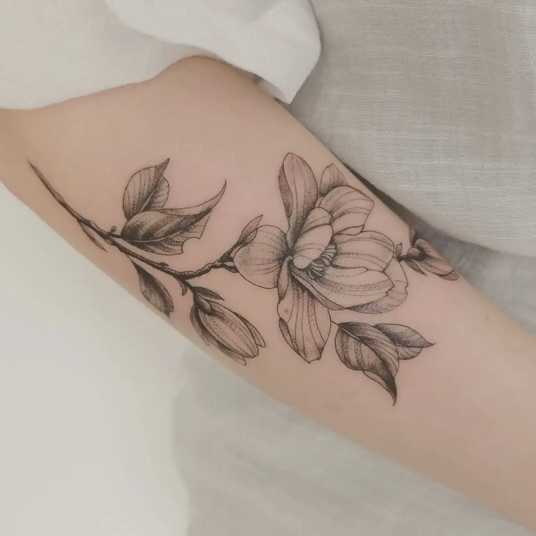 Stunning Magnolia Tattoo with Delicate Lines
