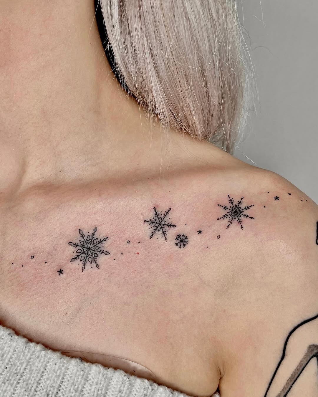 Beautiful snowflake tattoo design on shoulder