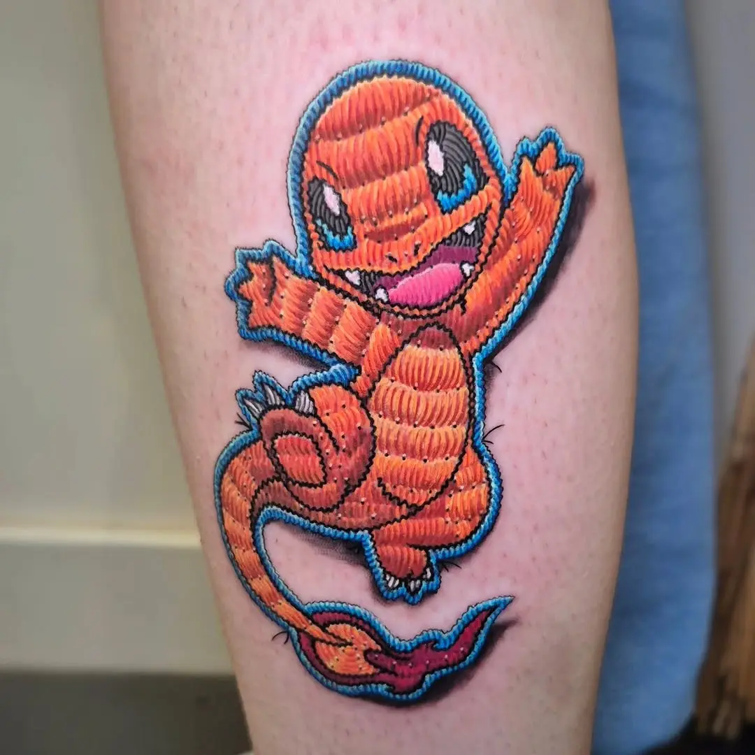 Adorable embroidery-style Charmander tattoo inspiration.